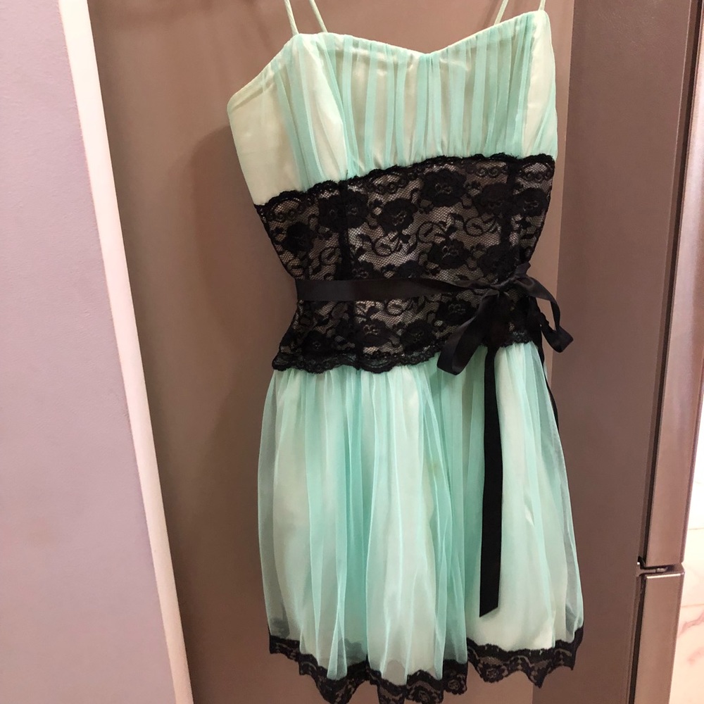 A sea foam colored foam formal dress